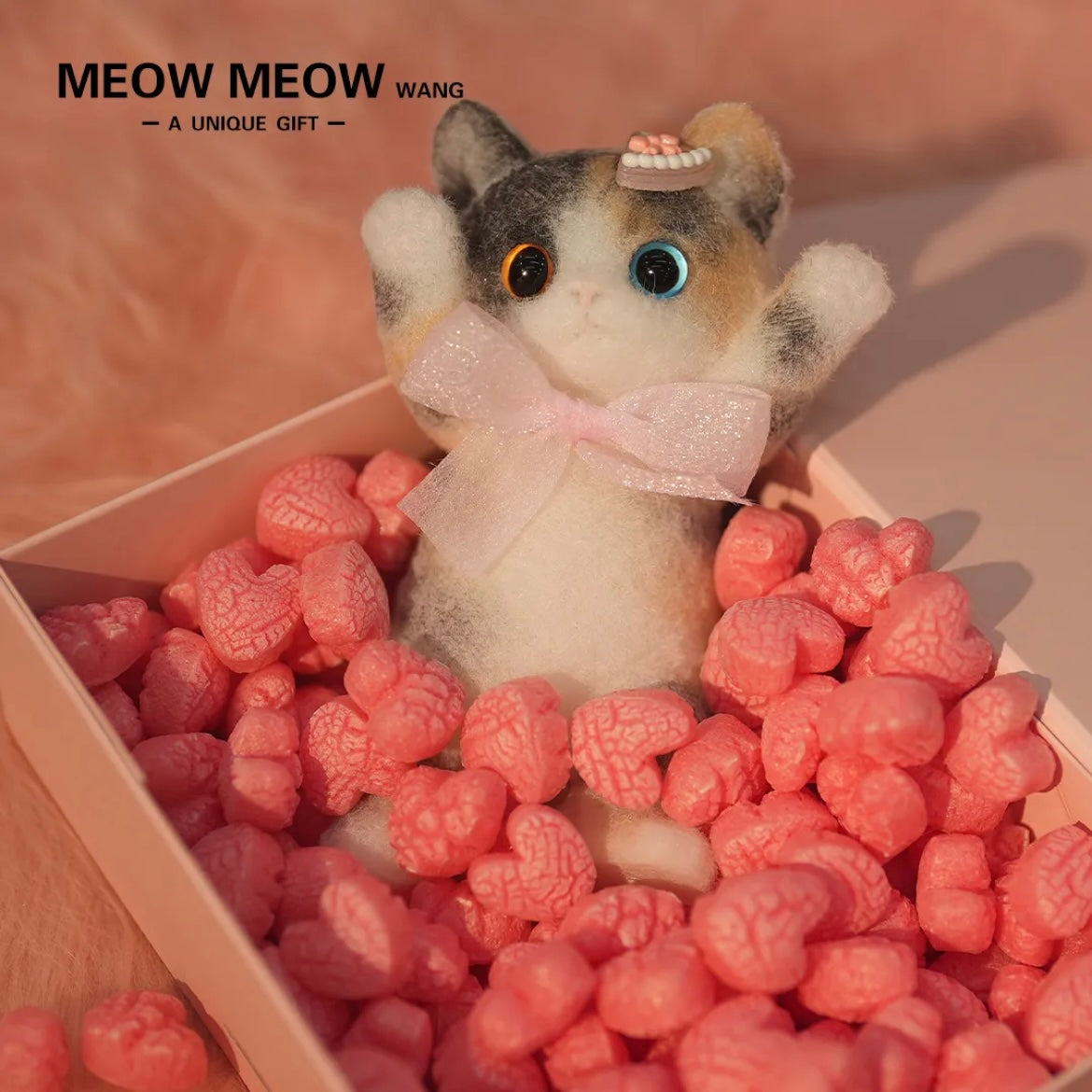 Adorable Calico Squishy Cat with the Blue and Yellow eyes