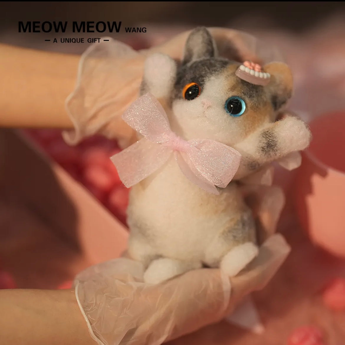 Adorable Calico Squishy Cat with the Blue and Yellow eyes