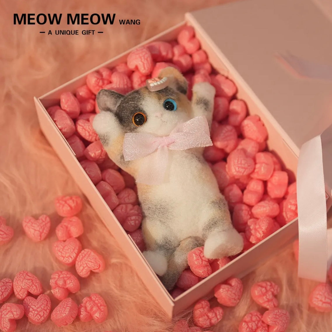 Adorable Calico Squishy Cat with the Blue and Yellow eyes