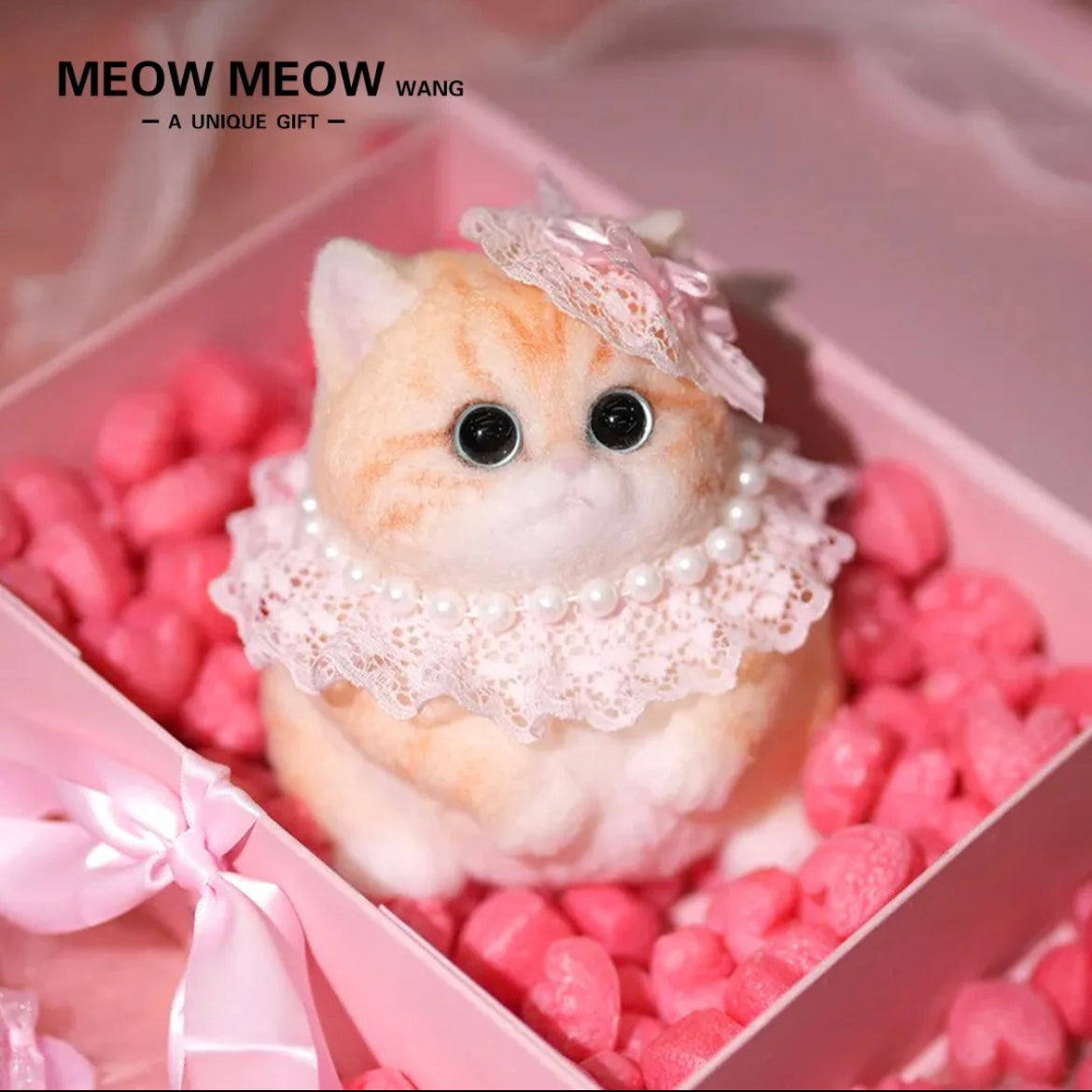 Round Orange chubby cat with a pink hat