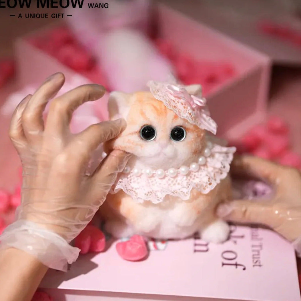 Round Orange chubby cat with a pink hat